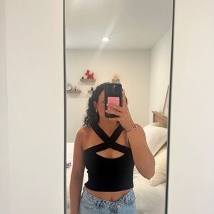 Black tank cross front